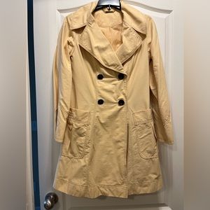 Pale yellow trench coat